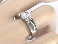 Gouden solitair ring met een grote diamant van 1.20 carat en kleine diamanten - afbeelding 2 van  8