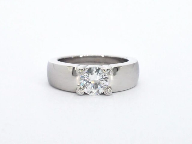 Gouden solitair ring met een grote diamant van 1.20 carat en kleine diamanten - afbeelding 6 van  8