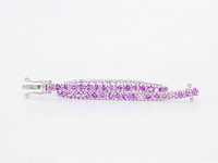 Gouden tennisarmband met 6.00 carat aan roze saffieren - afbeelding 1 van  8