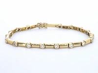 Gouden tennisarmband met diamanten schakels - afbeelding 1 van  10