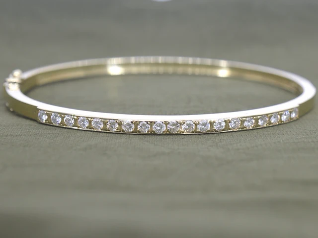Gouden vaste armband met briljant geslepen diamanten - afbeelding 1 van  10