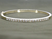 Gouden vaste armband met briljant geslepen diamanten - afbeelding 1 van  10