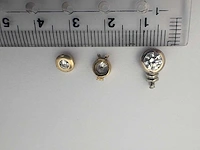 Gouden zettingen (totaal 0,60kt diamant) - afbeelding 2 van  2