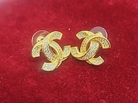 Goudkleurige oorbellen chanel model - afbeelding 3 van  4
