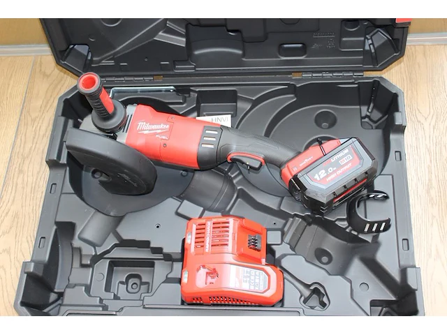 Haakse slijptol milwaukee m18 oneflag230xpdb incl. accu en lader in kunststof koffer - afbeelding 2 van  4