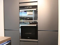 Häcker eilandkeuken met apparatenwand met apparatenwand en spoelwand - afbeelding 44 van  64