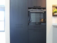 Häcker eilandkeuken met apparatenwand - afbeelding 16 van  34