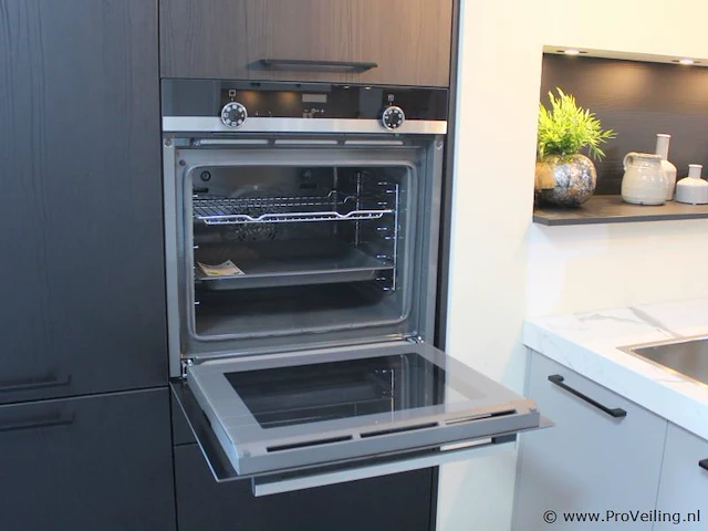 Häcker eilandkeuken met apparatenwand - afbeelding 24 van  34