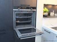 Häcker eilandkeuken met apparatenwand - afbeelding 24 van  34
