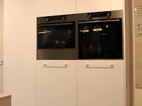 Häcker eilandkeuken met apparatenwand - afbeelding 13 van  41