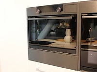 Häcker eilandkeuken met apparatenwand - afbeelding 16 van  41