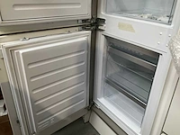 Häcker exclusieve eiland keuken met wand opstelling en kookplaat met afzuiging - afbeelding 36 van  50