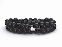 Halsketting met onix edelsteen en een witgouden sluiting met diamant - afbeelding 8 van  10