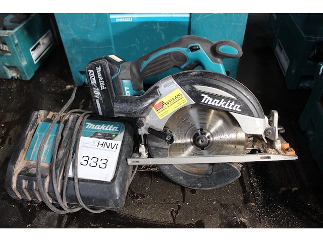 Handcirkelzaag makita met accu en lader in kunststof koffer. - afbeelding 1 van  3