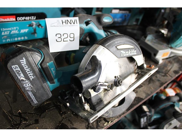 Handcirkelzaag makita met accu en lader. - afbeelding 2 van  4