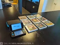 Handheld game console met 9x game nintendo, 2ds xl, bouwjaar 2018 - afbeelding 1 van  41