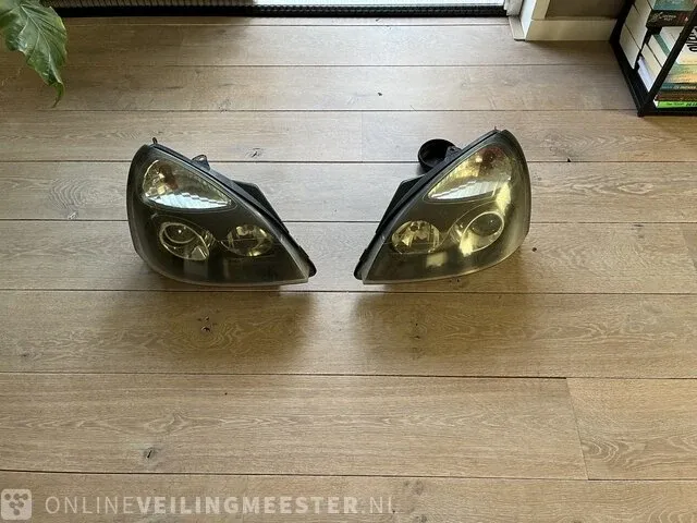 Hello xenon koplampen clio ii hella, xenon, 2002 - afbeelding 1 van  6