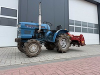 Hinomoto e-14 minitractor met grondfrees - afbeelding 1 van  21
