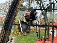 Hitachi eg70r roterende rupsdumper met silageopbouw - afbeelding 31 van  61