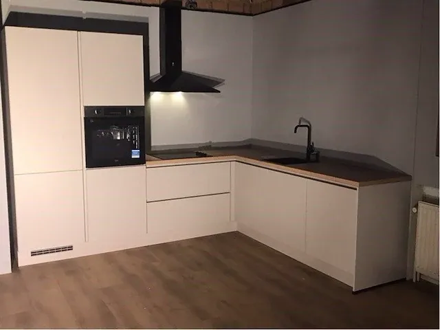 Hoek opgestelde keuken - afbeelding 16 van  22