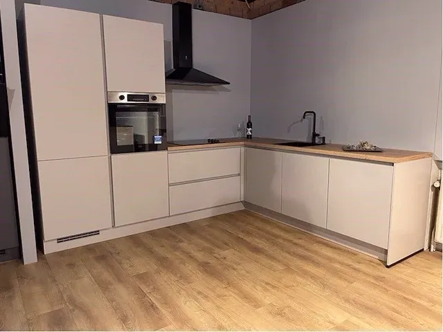 Hoek opgestelde keuken - afbeelding 18 van  22