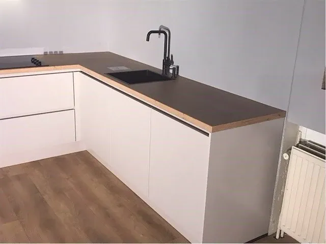 Hoek opgestelde keuken - afbeelding 19 van  22