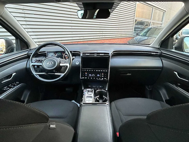 Hyundai tucson 1.6 t gdi hev comfort smart automaat; k-053-sk - afbeelding 23 van  23