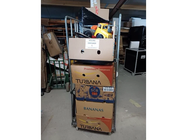Inhoud rolcontainer met 2e hands en nieuw ex container nummer c - afbeelding 1 van  9