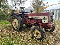 International 383 tweewielaangedreven landbouwtractor - afbeelding 21 van  27