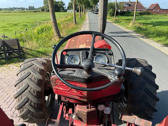 International 744 vierwielaangedreven landbouwtractor - afbeelding 11 van  34
