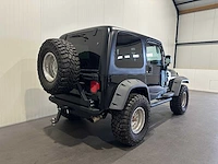 Jeep wrangler 2.4i softtop 4x4 j-897-zj - afbeelding 16 van  20