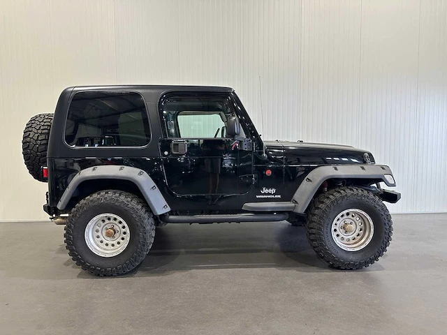 Jeep wrangler 2.4i softtop 4x4 j-897-zj - afbeelding 17 van  20