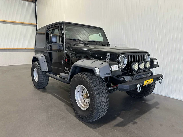Jeep wrangler 2.4i softtop 4x4 j-897-zj - afbeelding 18 van  20
