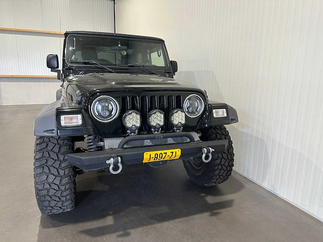 Jeep wrangler 2.4i softtop 4x4 j-897-zj - afbeelding 19 van  20