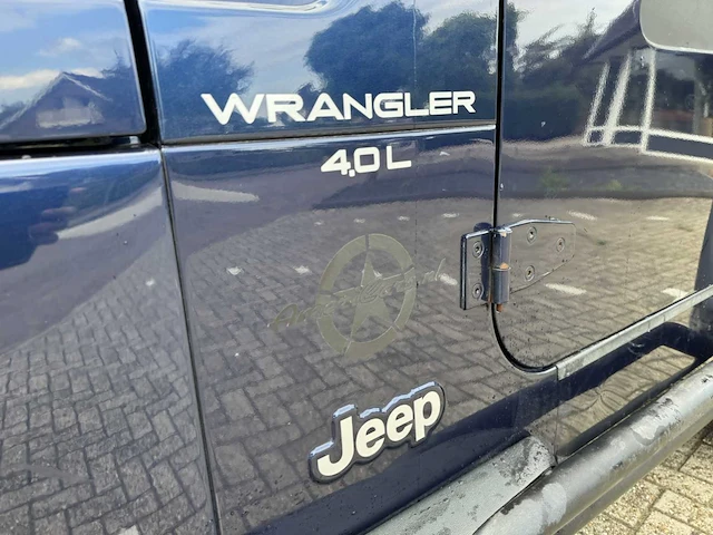 Jeep wrangler 4.0 l personenauto - afbeelding 8 van  24