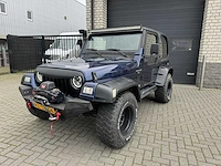 Jeep wrangler 4.0 l personenauto - afbeelding 1 van  24