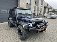 Jeep wrangler 4.0 l personenauto - afbeelding 18 van  24