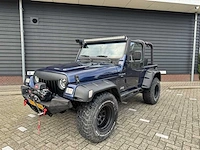 Jeep wrangler 4.0 l personenauto - afbeelding 19 van  24