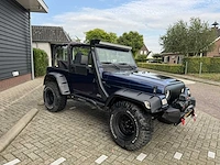 Jeep wrangler 4.0 l personenauto - afbeelding 23 van  24