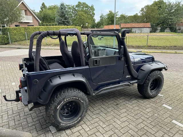 Jeep wrangler 4.0 l personenauto - afbeelding 24 van  24