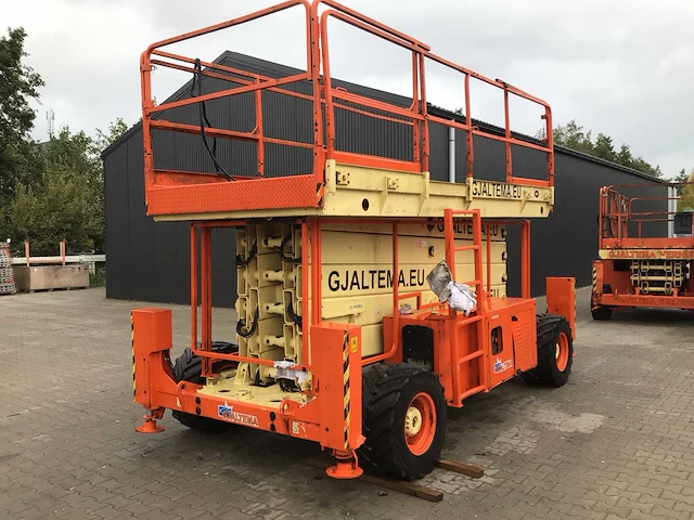 Jlg - 500 rts 4x4 - ruwterrein schaarhoogwerker - 2002 - afbeelding 1 van  18
