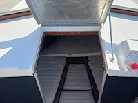 Kajuit boot met buitenboord motor en trailer - afbeelding 15 van  55