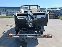 Kajuit boot met buitenboord motor en trailer - afbeelding 34 van  55