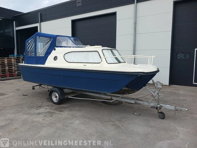 Kajuitboot met buitenboordmotor en trailer birchwood 18 - afbeelding 1 van  50