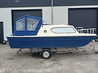 Kajuitboot met buitenboordmotor en trailer birchwood 18 - afbeelding 23 van  50