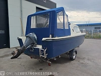 Kajuitboot met buitenboordmotor en trailer birchwood 18 - afbeelding 34 van  50