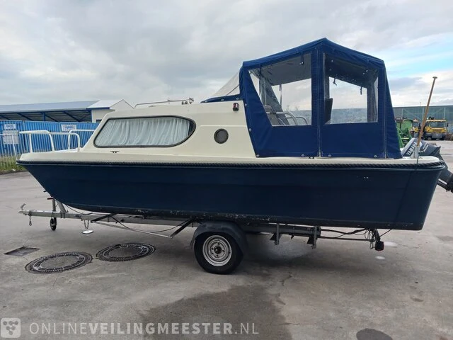 Kajuitboot met buitenboordmotor en trailer birchwood 18 - afbeelding 48 van  50