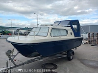 Kajuitboot met buitenboordmotor en trailer birchwood 18 - afbeelding 49 van  50