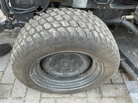 Kubota trekker met veeg- en zuiginstallatie - afbeelding 39 van  49