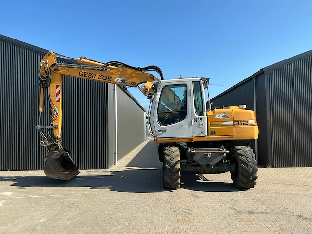 Liebherr a312 litronic banden graafmachine / mobiele kraan - afbeelding 17 van  50